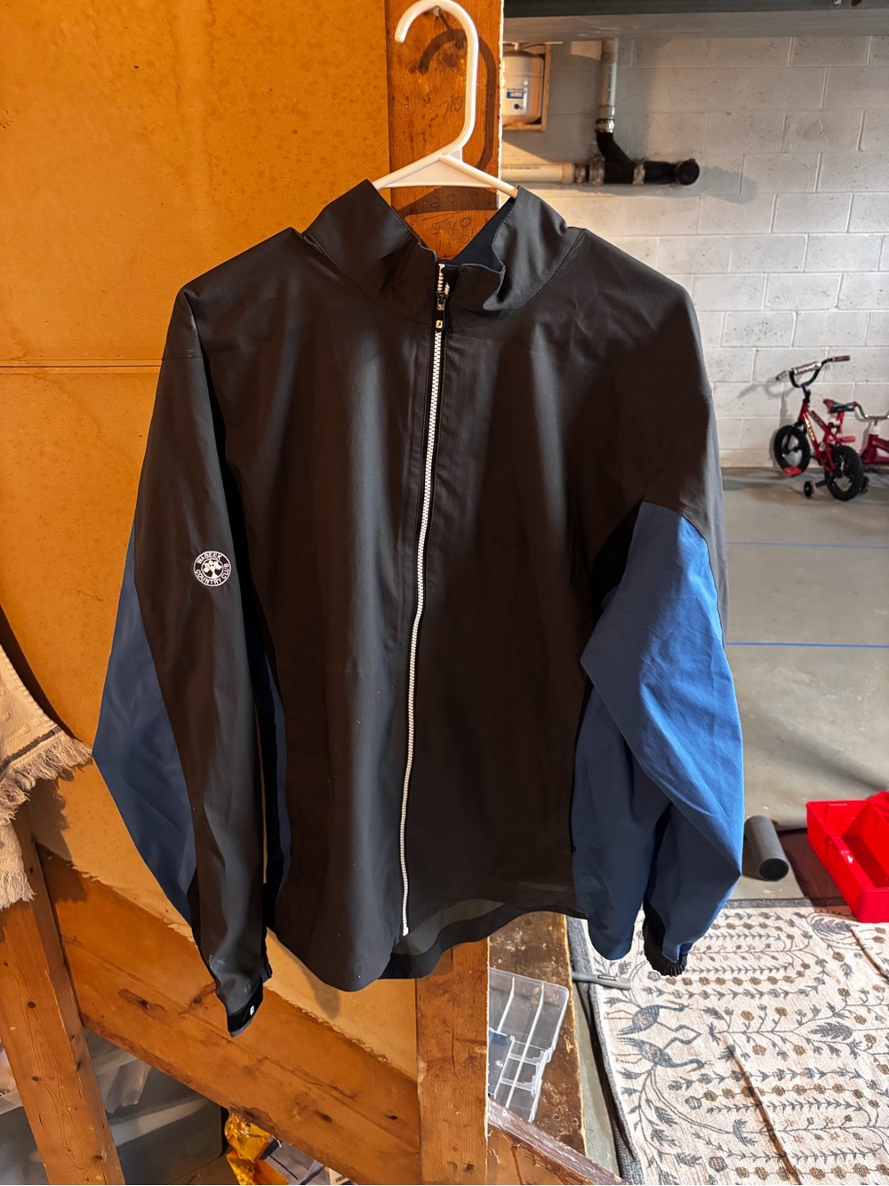 FootJoy Black Windbreaker with Blue Sleeve Panels